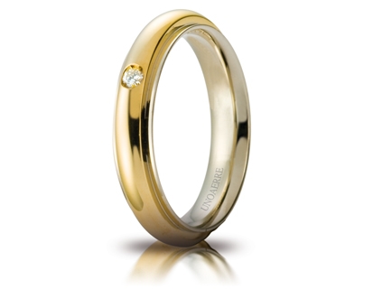 [070AFC281001001075007] Fede nuziale Unoaerre Brillanti Promesse Andromeda 4 mm oro bicolore con diamante